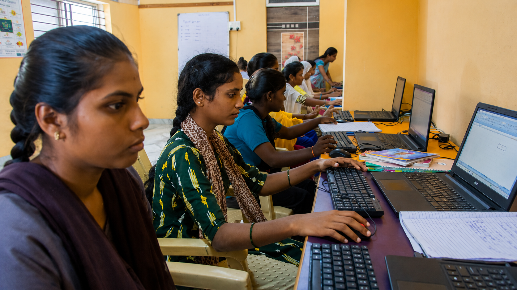 Women learning digital skills together