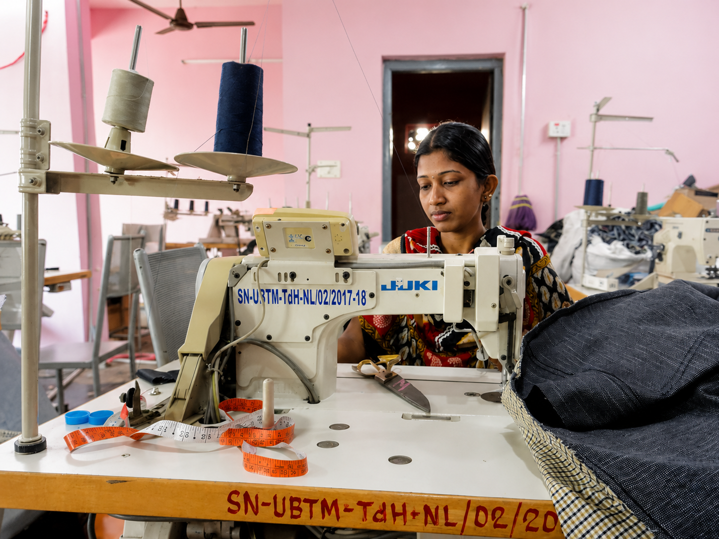 Woman sewing in a workshop